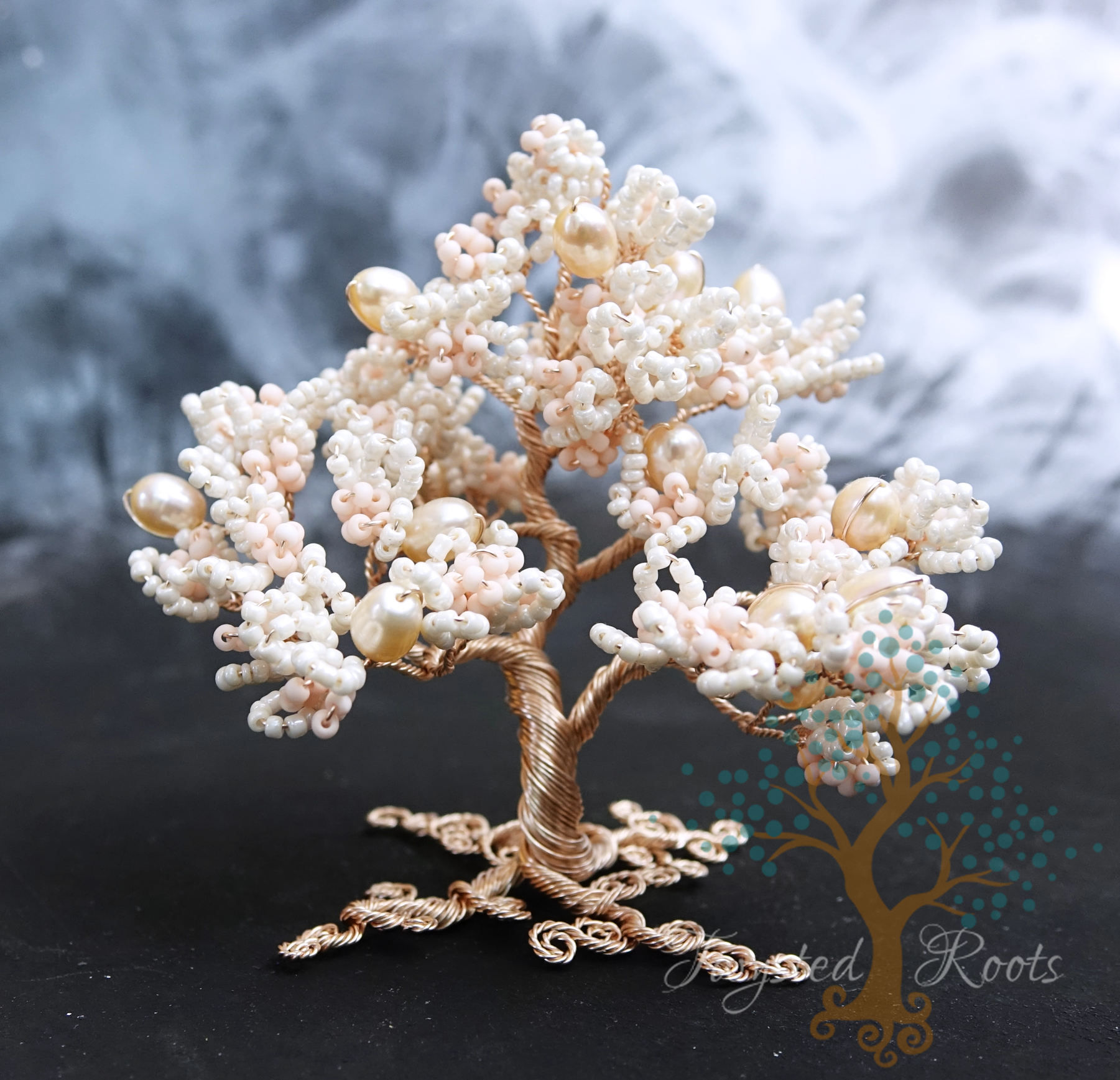 Pastel cream and light peach coloured bead and wire tree made by Twysted Roots
