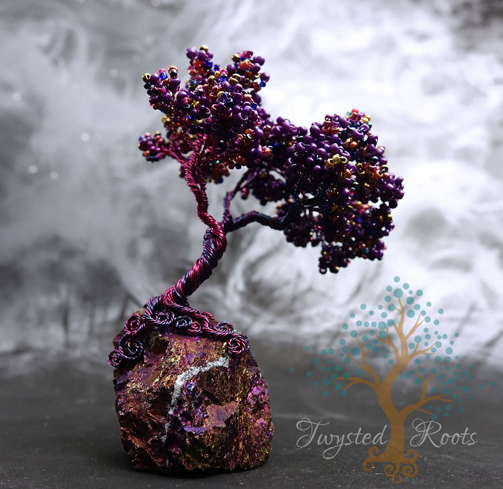Thumbnail: Deep purple bead and wire tree sculpture on a peacock ore base