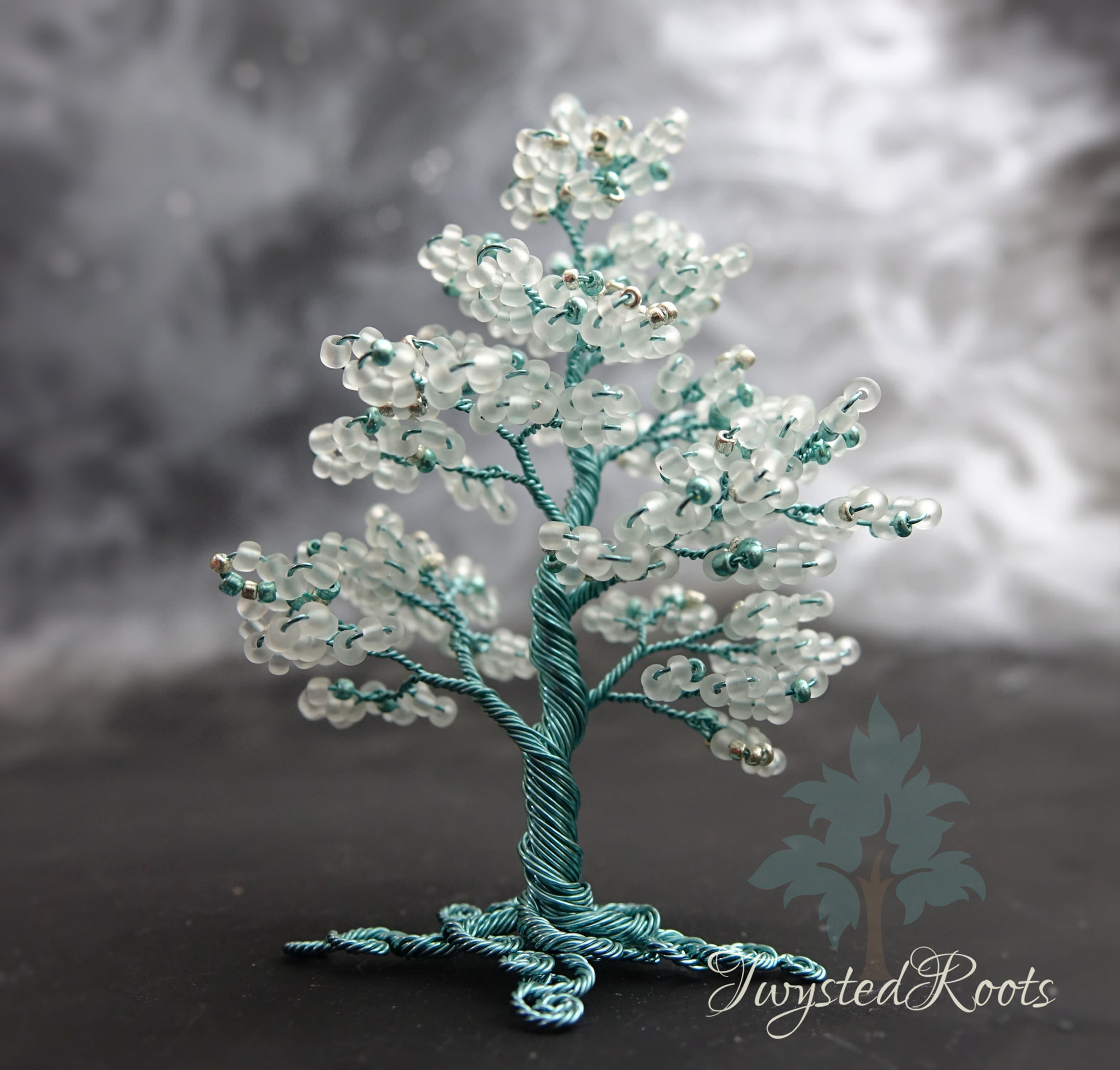 White bead and turquoise wire tree sculpture by Twysted Roots