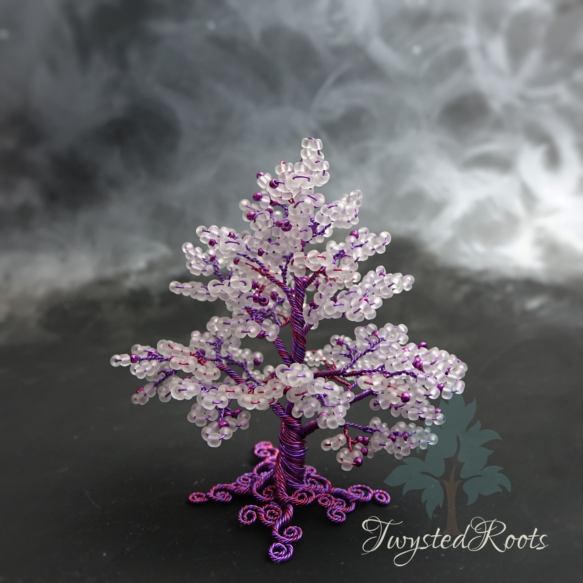 White bead and purple wire tree sculpture by Twysted Roots