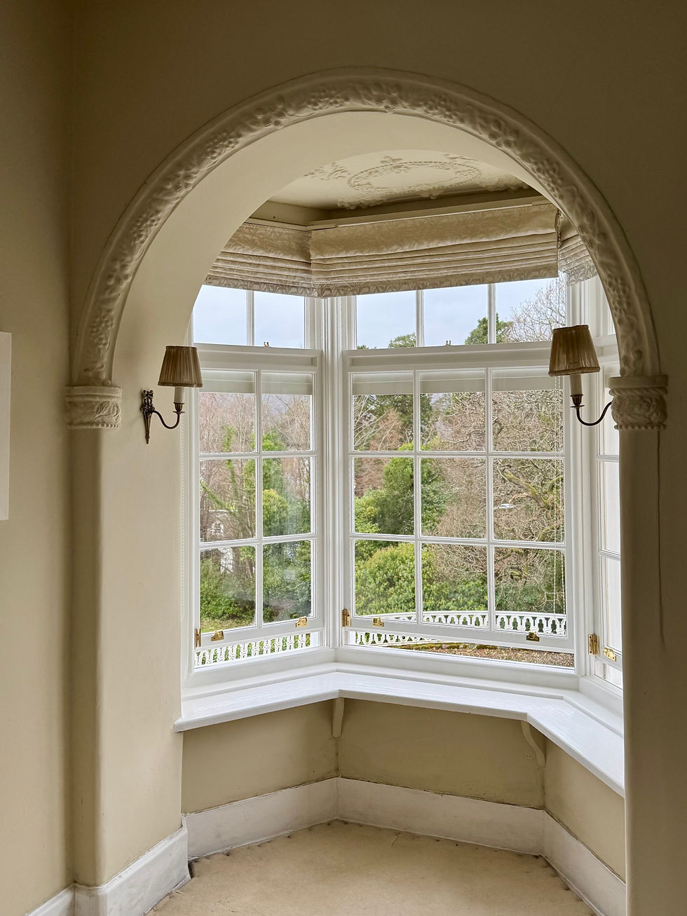A restored bay window featuring integrated draught-proofing, preserving original architecture while improving thermal comfort. MWM Matt Window Mate