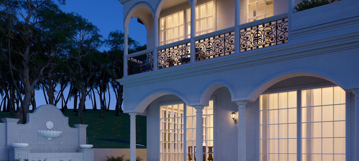 Elegant white villa with pool at dusk - Beera Homes Goa