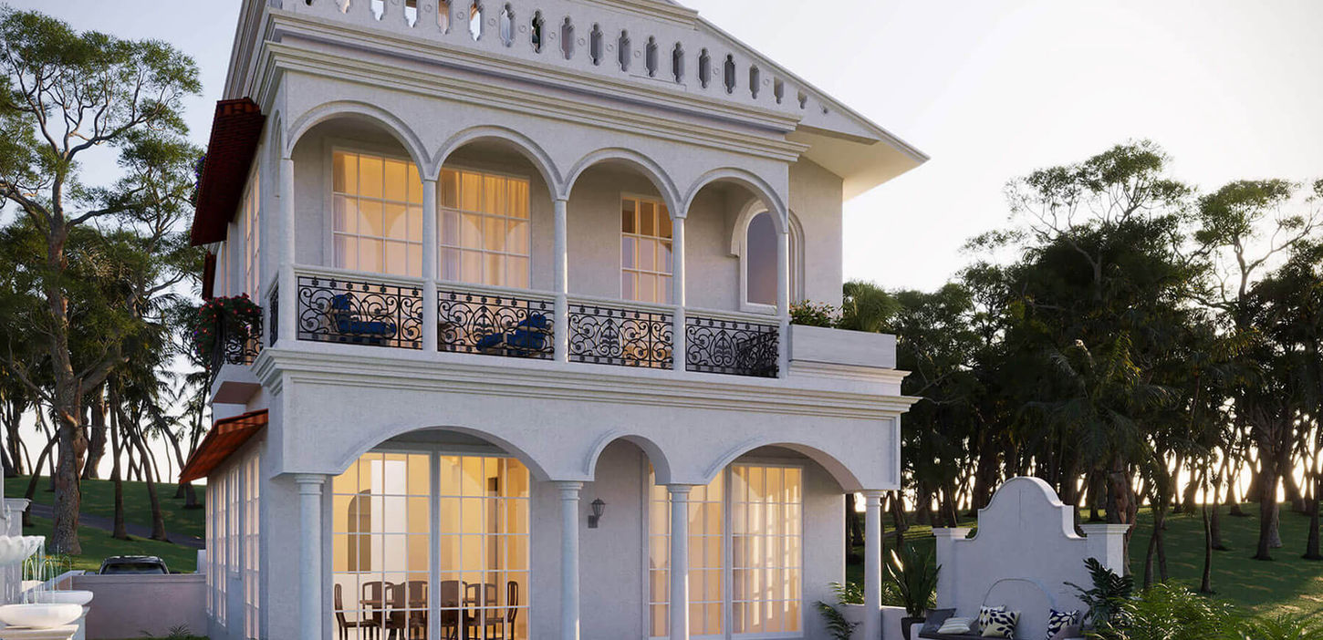 Exterior view of a white villa with arched windows and balconies Beera Homes Goa.