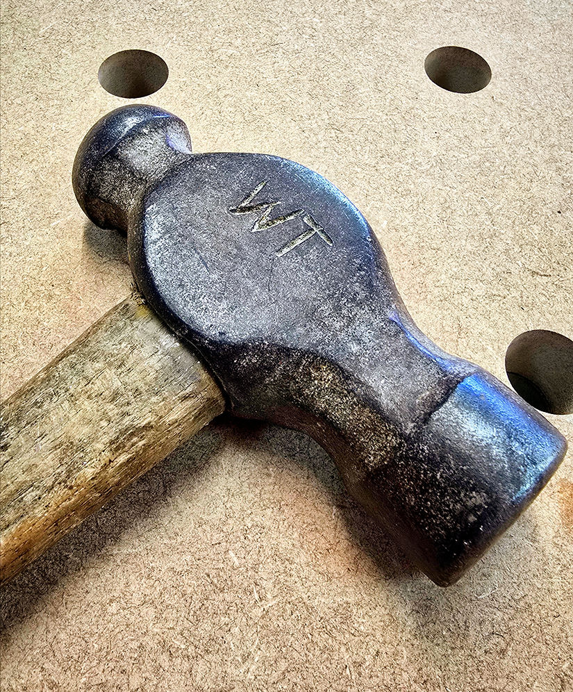 Vintage hammer engraved with initials WT — inspiration for 345 Square