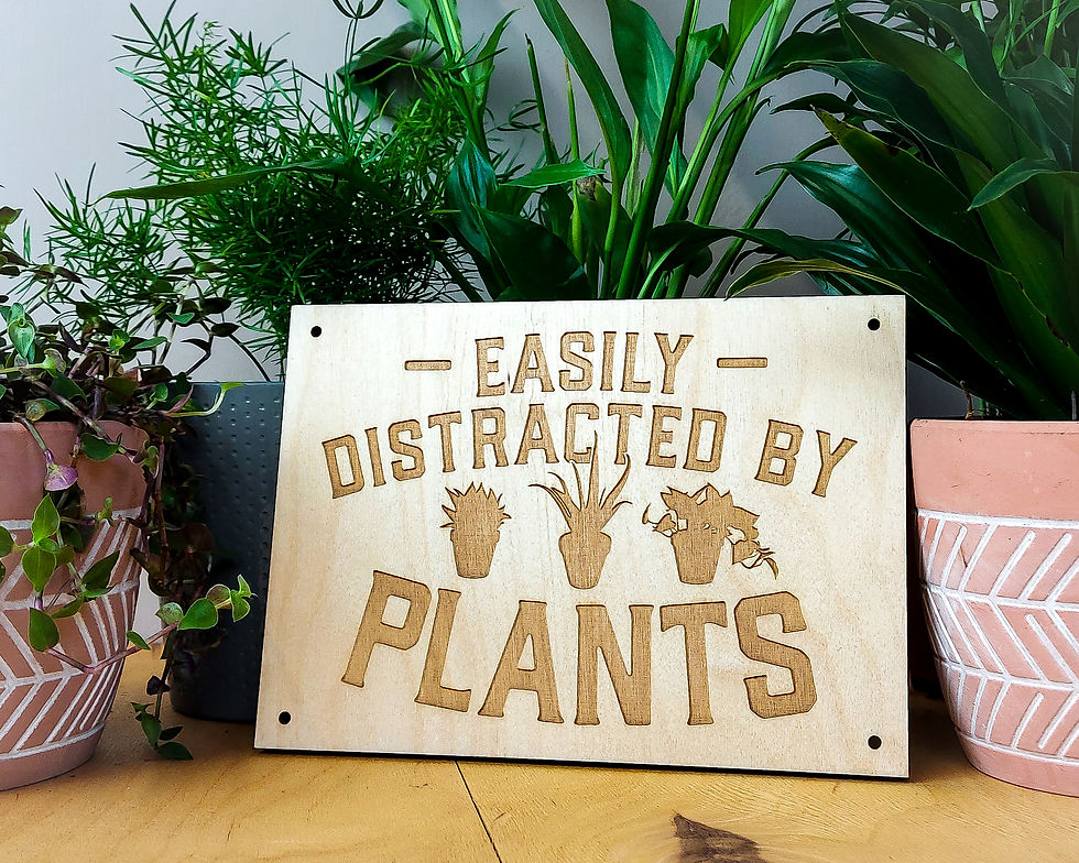 Thumbnail: Wooden Garden Sign - Easily distracted by plants