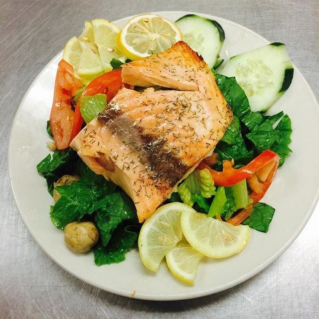 Salmon on a bed of greens $7