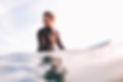 Cute surfer boy in water