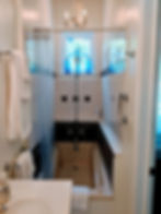 Ellicott Guest Room en suite bathroom with bathtub and shower