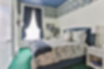 Ellicott Guest Room in shades of periwinkle blue, lilac, green and creamy whites