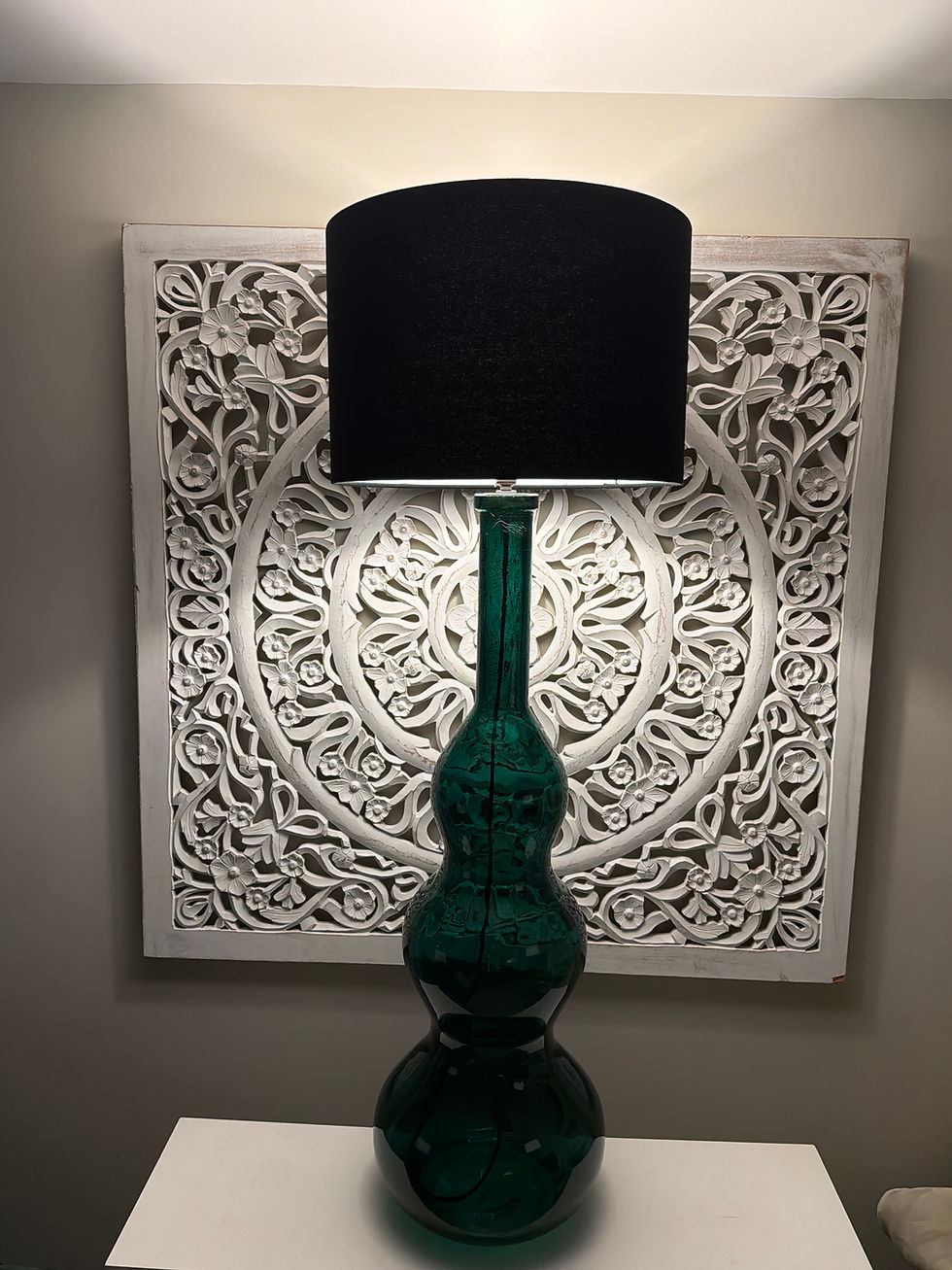 Thumbnail: Large green glass statement floor lamp styled with back shade