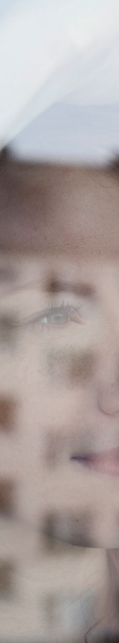 Woman Looking Out the Window