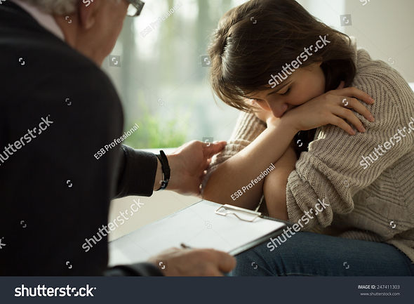 stock-photo-close-up-of-psychologist-comforting-his-depressed-patient-247411303.jpeg
