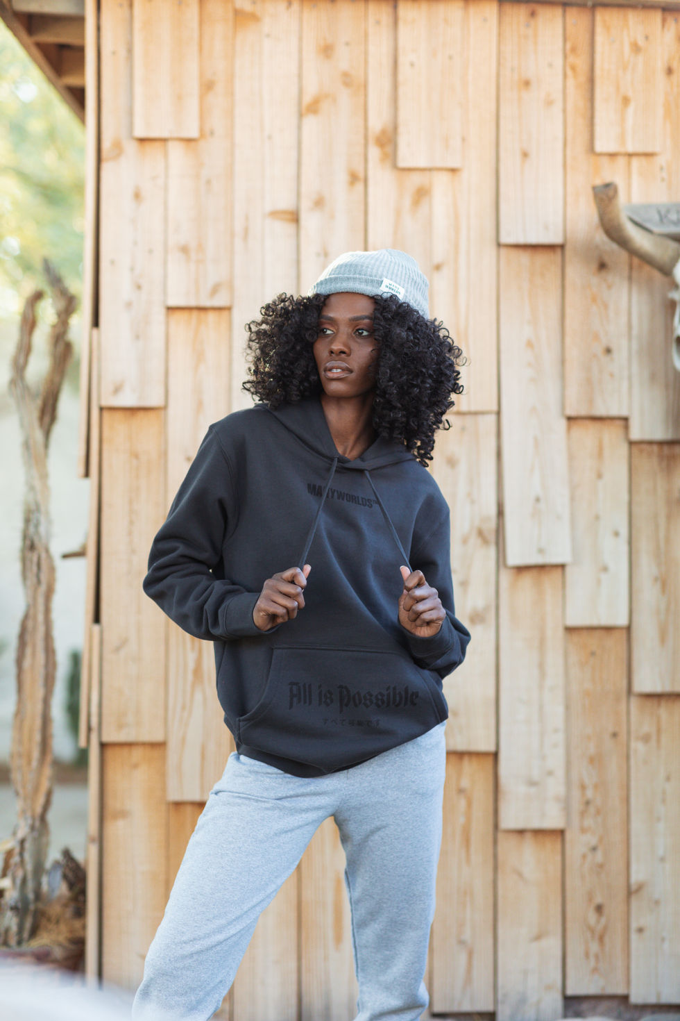 Many Worlds Black Hoodie Lifestyle Zay 24.jpg