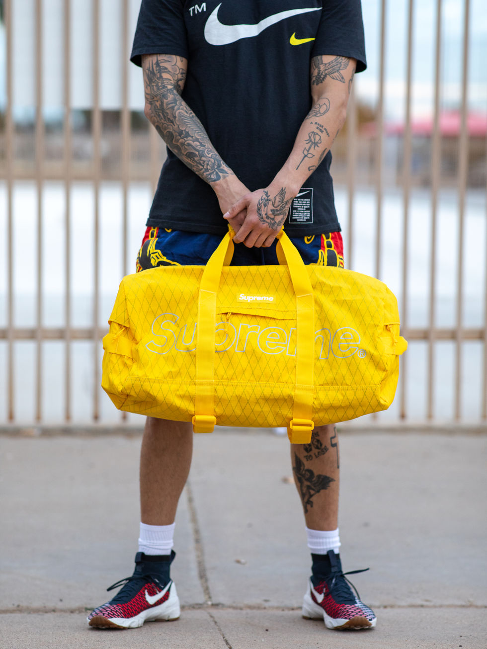 Many Worlds Yellow Supreme Bag Lifestyle 4.jpg