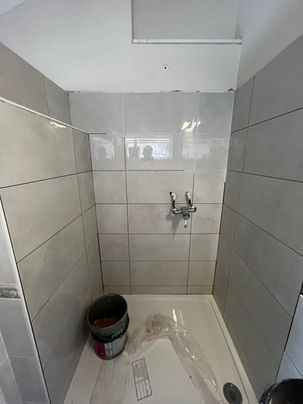 grey porcelain tiles with white grout