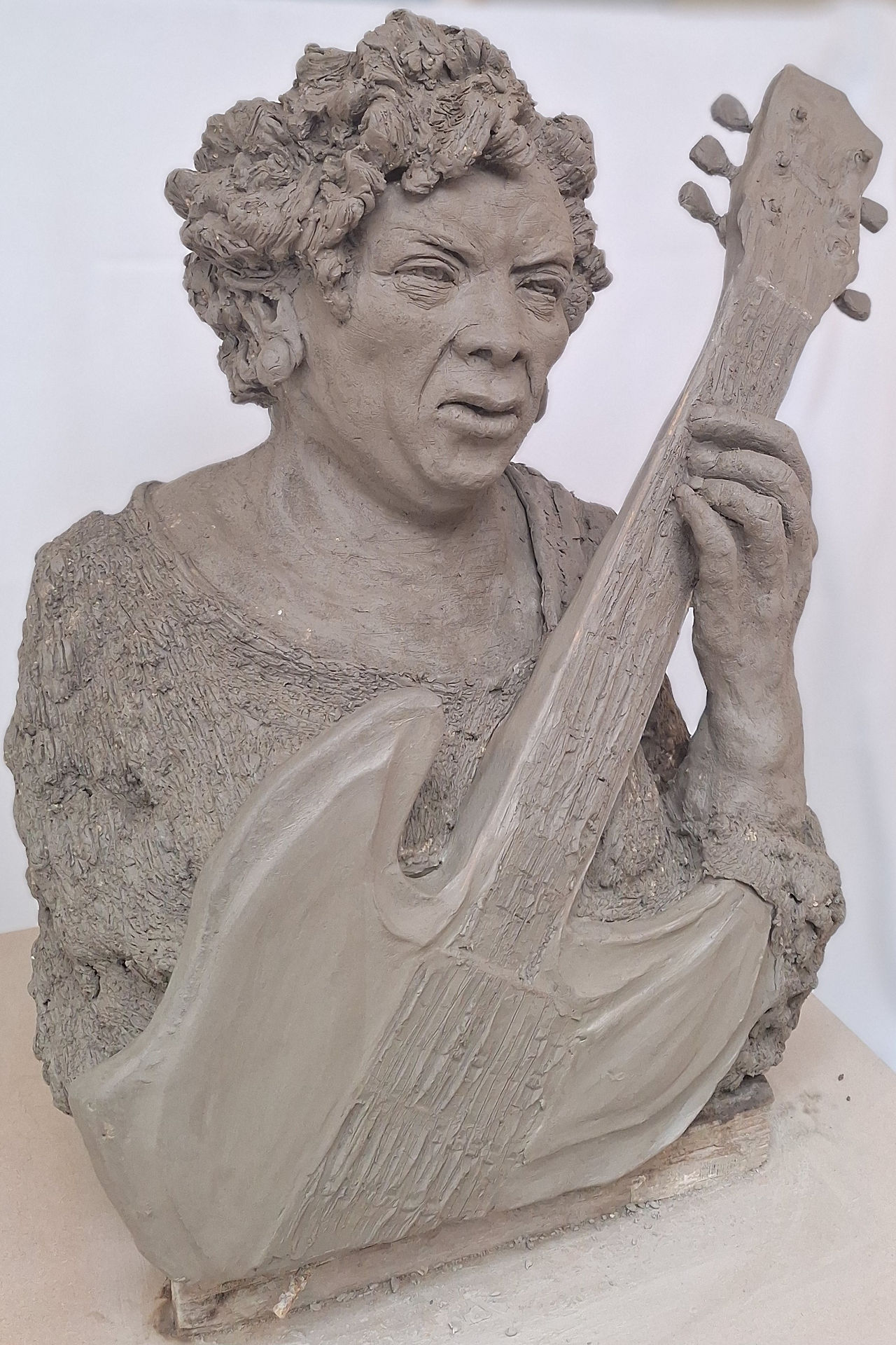Sculpture of a likeness of Sister Rosetta Tharpe playing an electric guitar