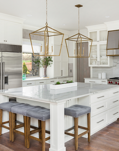 Luxury kitchen with gold light fixtures