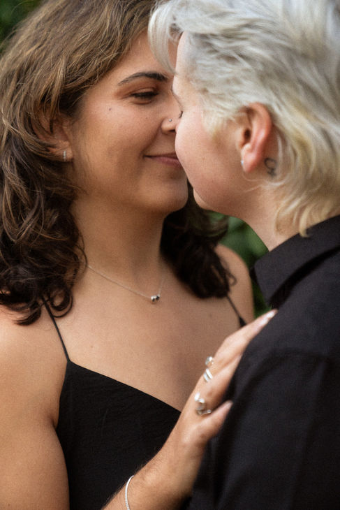 Two people about to kiss, close-up.
