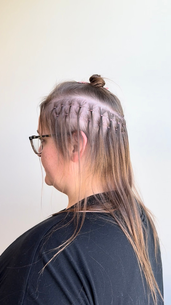 Partial mesh integration: a breathable mesh base supporting extensions on very fine hair