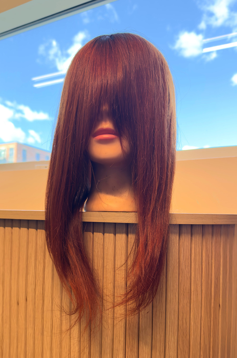 Clip-on topper custom coloured a rich copper, shown on a mannequin