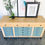 Thumbnail: Sheldon - Wood and Light Blue Entertainment Center