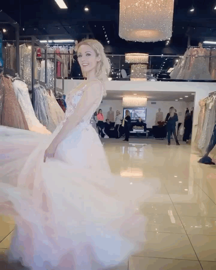 Veronica Farren dress twirl gif behind the scenes showroom model