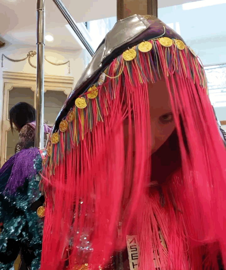 shaking hood with hot pink strings gif Veronica Farren behind the scenes