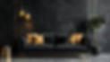 black-couch-with-pillows-black-wall-it.jpg