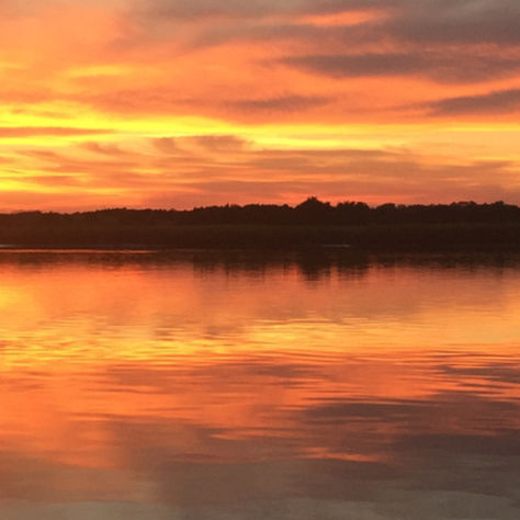 Where to watch the sunrise and sunset on Oak Island, NC.