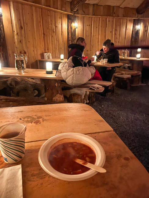 Reindeer stew inside of a traditional lavvo Sami tent in Tromso Norway in the winter