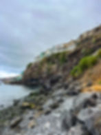 Praia do Toco a small cliffside fishermans beach in Funchal on Madeira Island