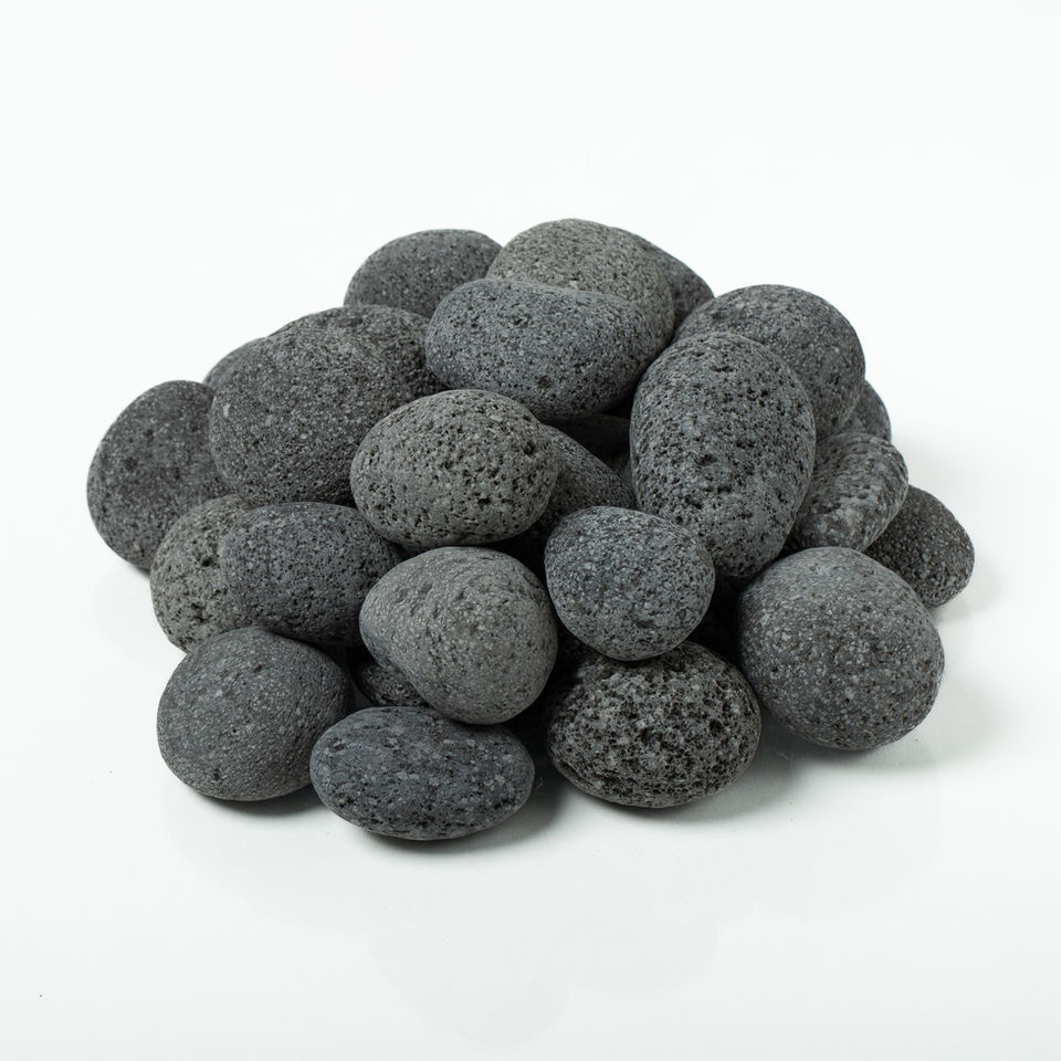 Pile of Medium Gray Tumbled Lava (1"–2") rocks on a white surface.