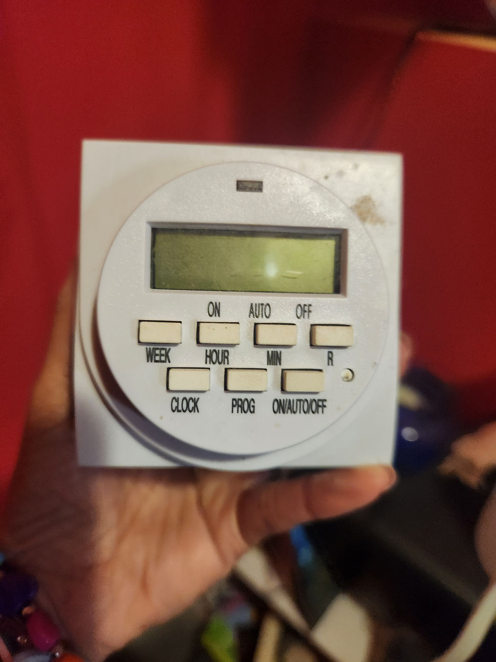A plant light timer. I don't know what the buttons do anymore.