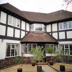 Detailed assessment of a historic manor house and its grounds.