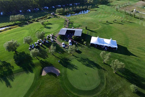 golfcourse_tent_Oasis_Grove_drone.png