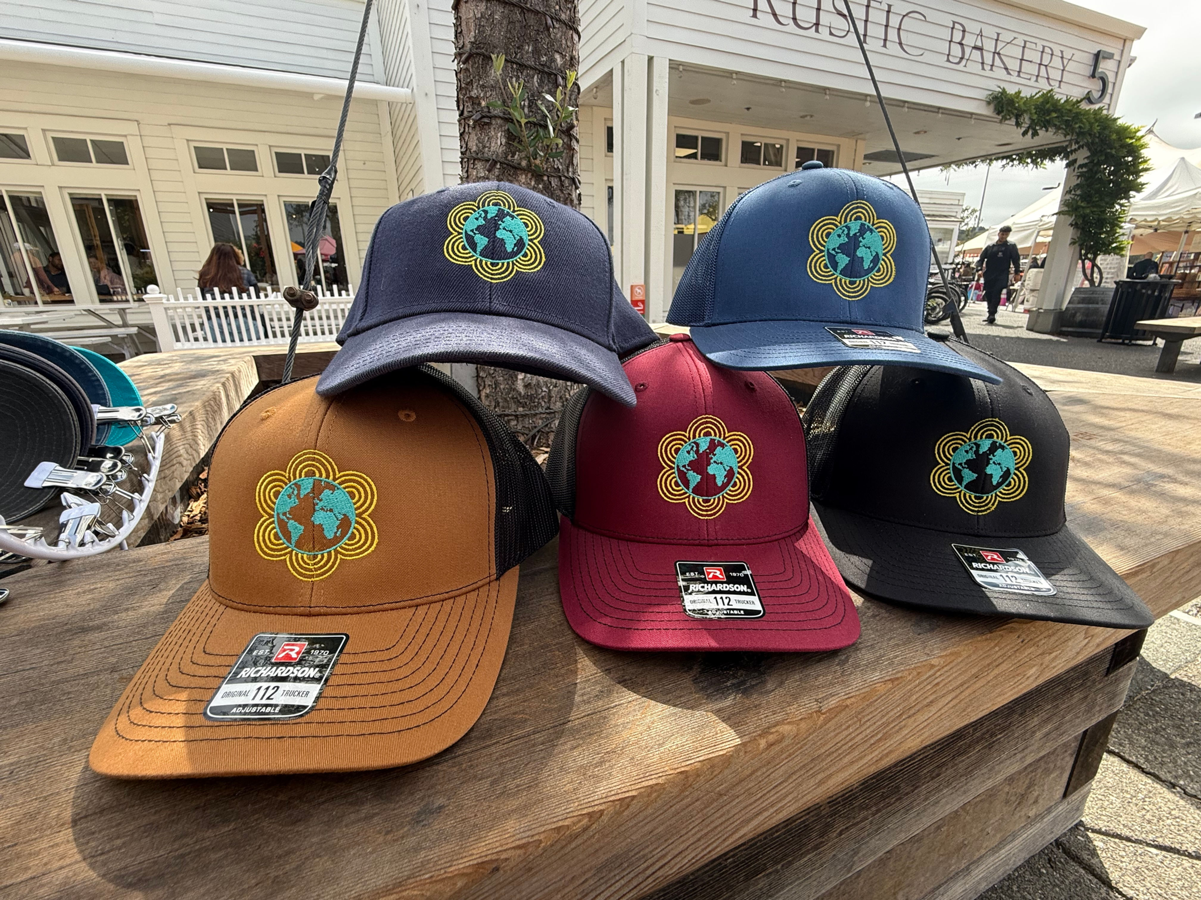 WeaveThe World A Better Place Trucker Hats