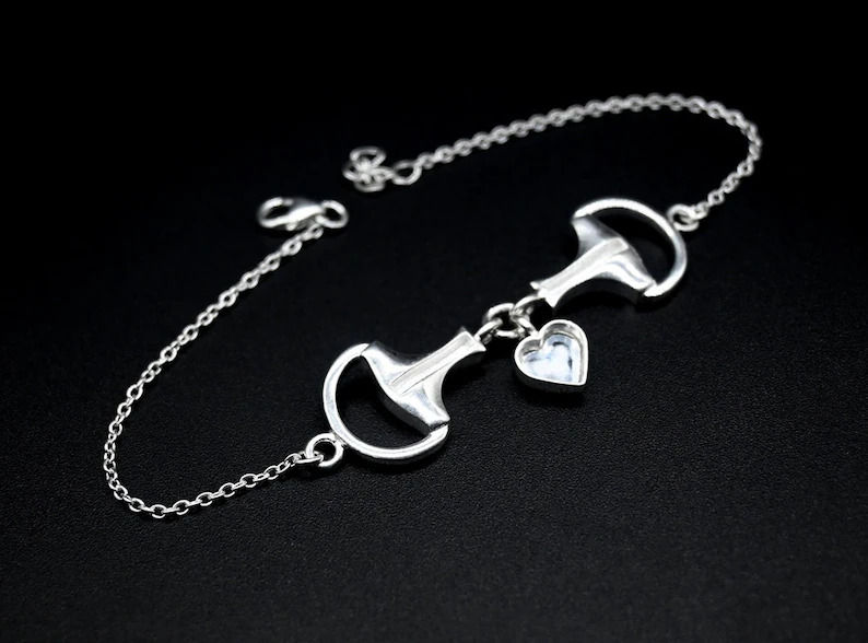 Snaffle Bit Horse Bracelet With Heart Shape Bezel In 925 Sterling Silver.