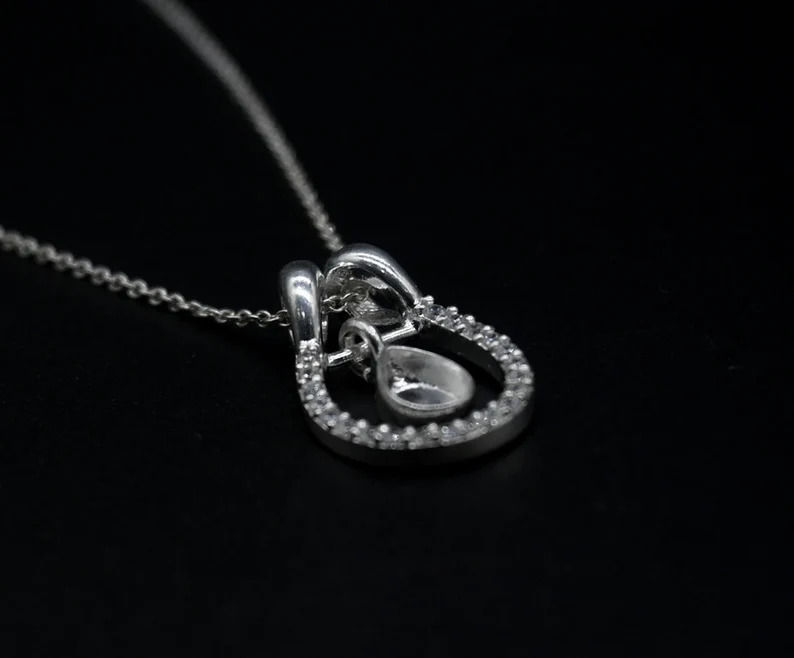 Thumbnail: Pear Bezel Horse Shoe Good Luck Pendant With CZ In 925 Sterling Silver.