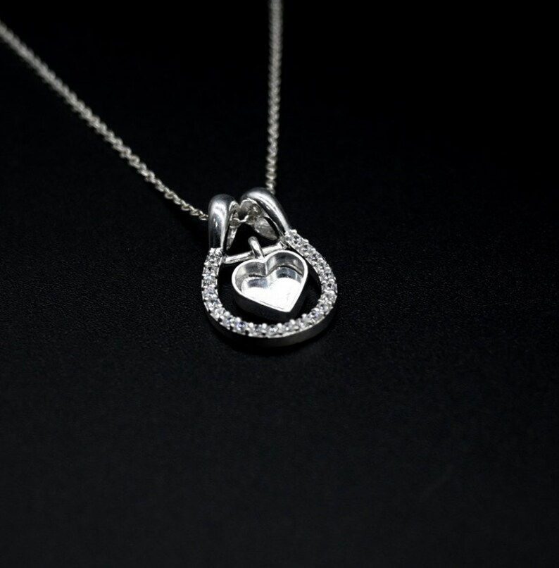Thumbnail: Heart Bezel Horse Shoe Good Luck Pendant With CZ In 925 Sterling Silver.
