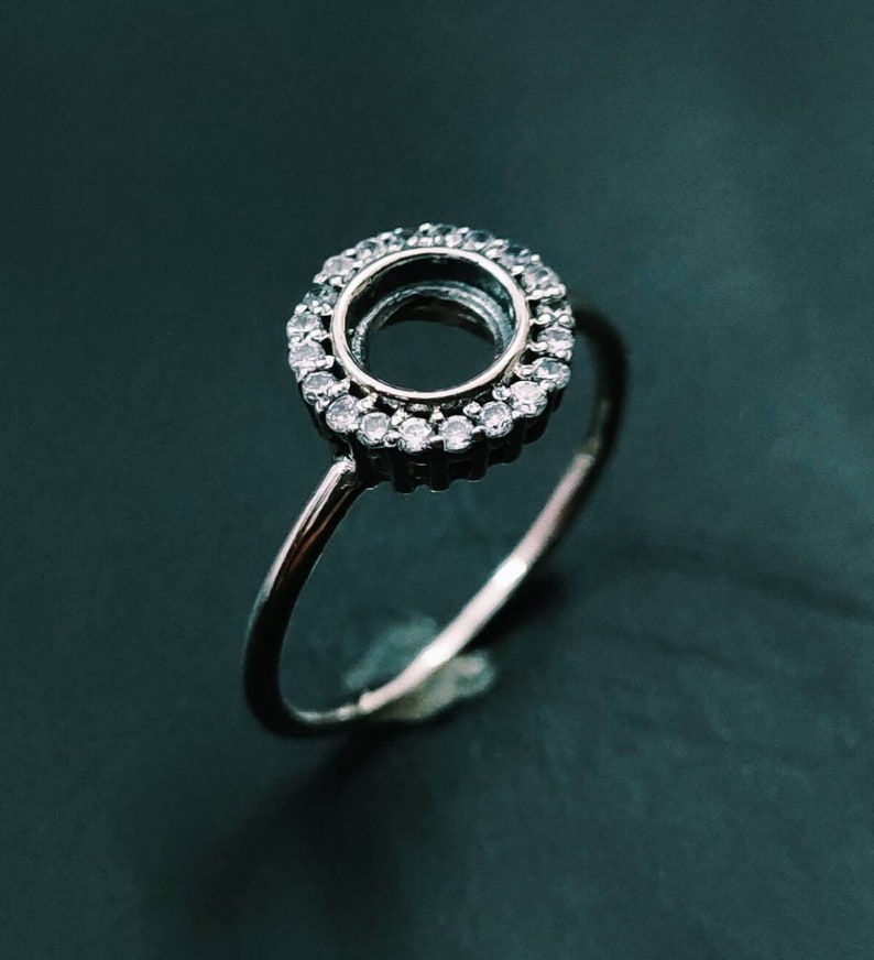 925 Sterling Silver Ring Round 6MM Bezel Setting With Small CZ Gemstones.
