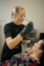 Medical aesthetics team preparing for wellness and beauty event consultations.