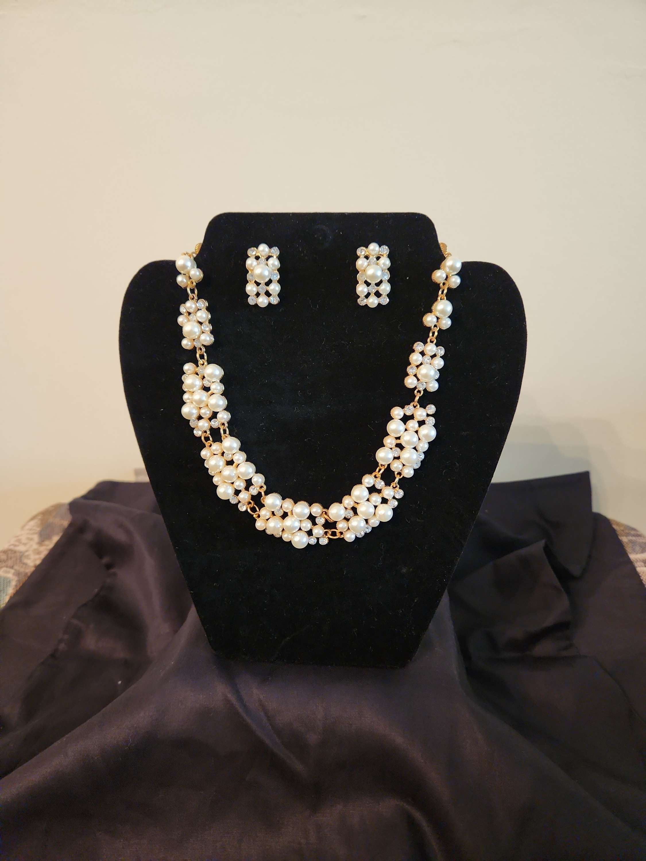 Double Strand Pearl Necklace and Earring Set.