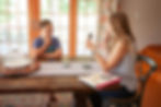 A speech therapist working with a boy