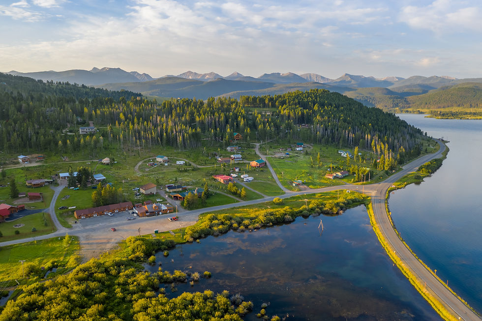 Wide angle view of Georgetown Lake surrounded by trees and mountains