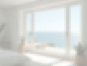 Environmental-shot-showcasing-a-pristine-coastal-home-with-sparkling-windows-under-natural