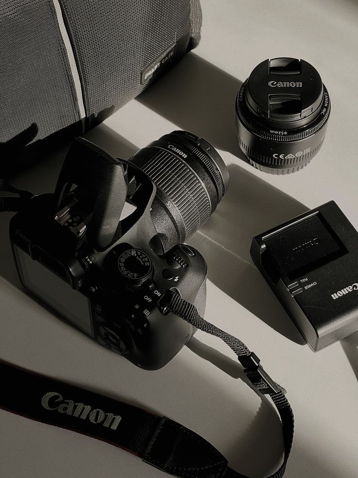 Canon camera, lens, and battery charger
