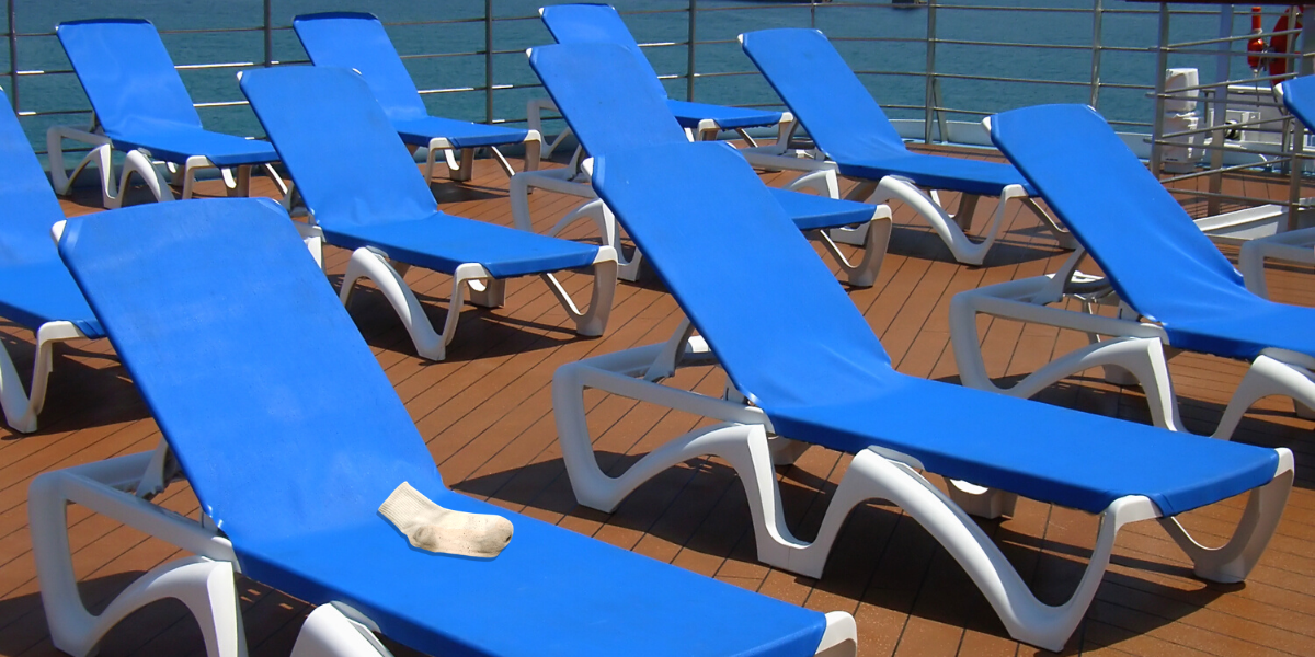 A sock lounging an a sun chair on a cruise
