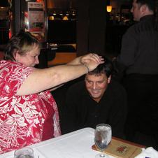 Susy Gaffney blesses a magician at an AU