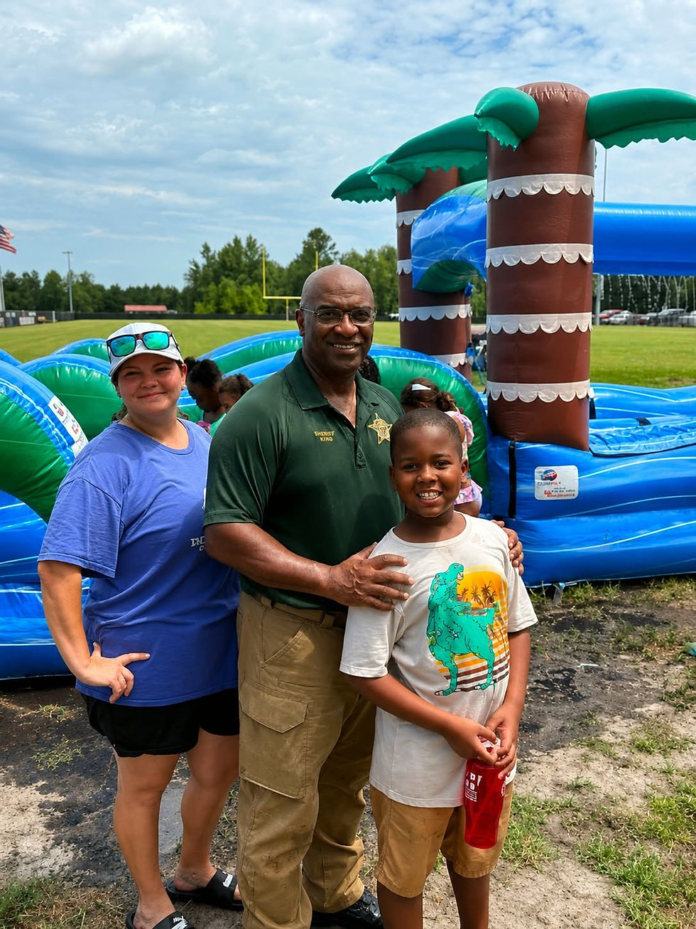 Community partnership event with sheriff and local children