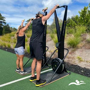 2 people of the skiErg on the Yard at Northern Arena